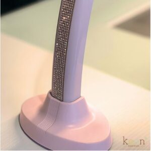 A pink KEEN LUNA LED Tabletop Lamp 9100 with rhinestones on it.